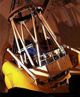 Left: The 3.6m CFHT in its dome on Mauna Kea. Right: The WIRCam was completed and installed on the CFHT during 2005.