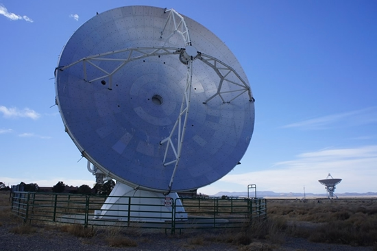 The ALMA-NA prototype telescope at Socorro, New Mexico, with one of the JVLA antennas.