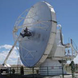 Retrofitting one of the ALMA prototype antennas for the use of VLBI in submillimeter wavelength. This picture shows the preliminary inspection of the antenna in July 2011, at the site of the Very Large Array near Socorro, New Mexico. This effort is led by ASIAA personnel, Philippe Raffin, Ted Huang, and Pierre Martin-Cocher, in collaboration with the engineers from Aeronautical Research Laboratory.