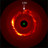 Moment-2 image for the 13C18O J = 3–2 transition of the fiducial model at face on. The location of the circumplanetary disk is labeled. A 4×10-3 stellar mass planet induces a prominent ring of high velocity dispersion inside the gap. This is the key planet-induced signature in this study (Dong, Liu, & Fung 2019).