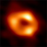 The first image of the supermassive black hole at the center of our Galaxy, Sgr A*. With this image, we are now very sure that this source is a supermassive black hole (in the Nobel Prize in Physics 2020, this source was still expressed as "a supermassive compact object at the centre of our galaxy").